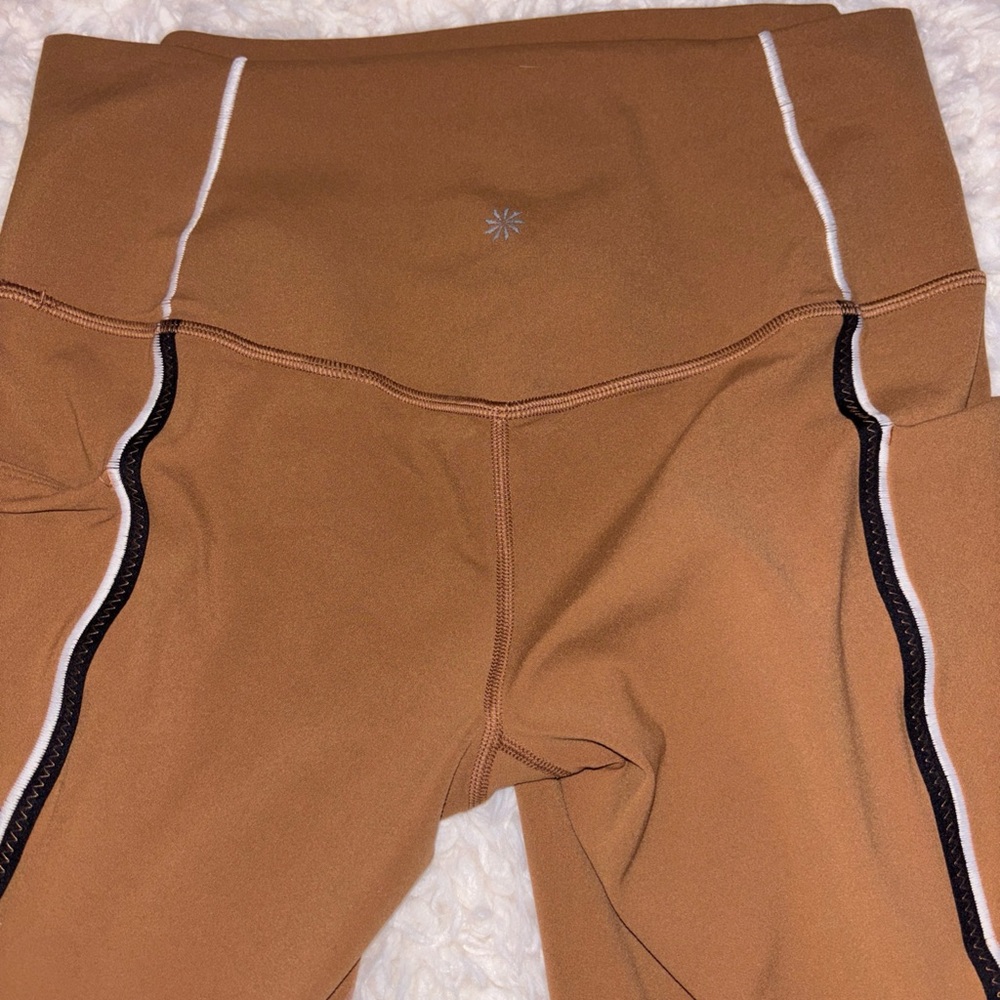 Athleta Salutation Stash Tipped Tight in Warm Camel